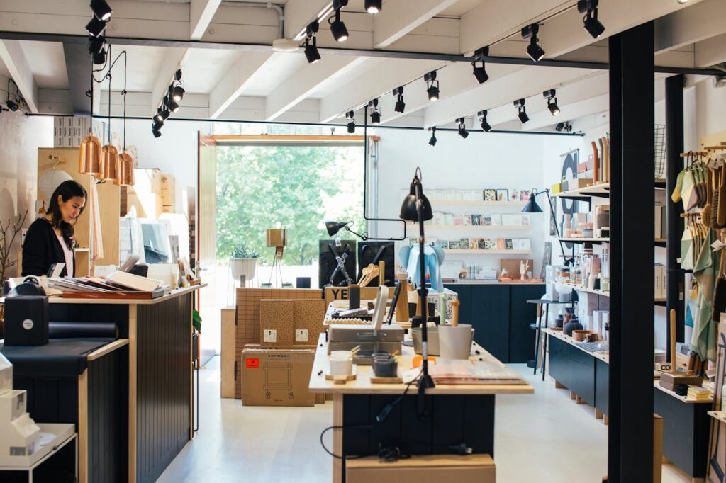 Trendy store interior featuring a female customer browsing surrounded by chic decor.